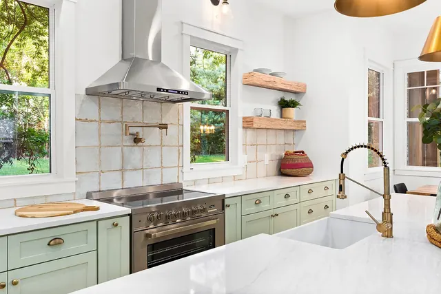 Kitchen range and tile backsplash at 1108 Lenore St, Nashville, TN 37206