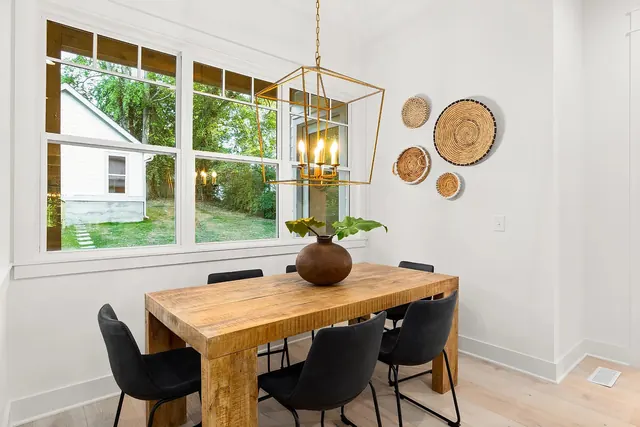 Dining area with large windows at 1108 Lenore St, Nashville, TN 37206