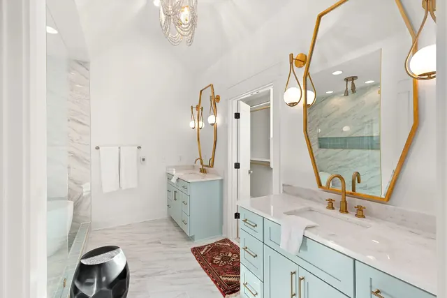 Primary bathroom with dual vanities at 1108 Lenore St, Nashville, TN 37206