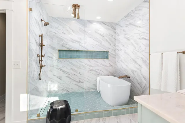 Wet room with soaking tub and shower at 1108 Lenore St, Nashville, TN 37206