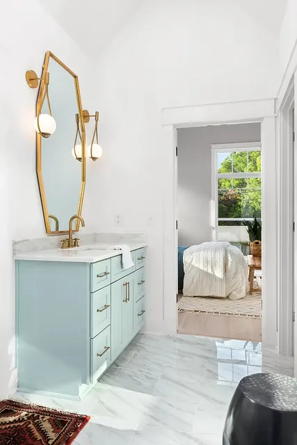 Bathroom vanity looking into bedroom at 1108 Lenore St, Nashville, TN 37206
