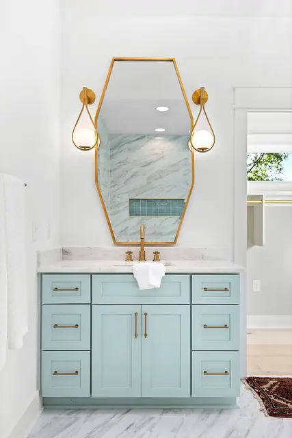Bathroom vanity with geometric mirror at 1108 Lenore St, Nashville, TN 37206