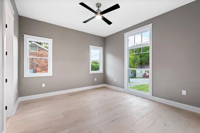 Bedroom with large windows at 1108 Lenore St, Nashville, TN 37206