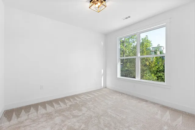 Empty bedroom with window at 1108 Lenore St, Nashville, TN 37206