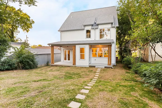 Rear exterior with covered porches at 1108 Lenore St, Nashville, TN 37206