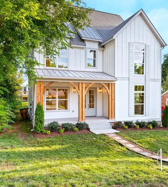 Front exterior with covered porch at 1108 Lenore St, Nashville, TN 37206
