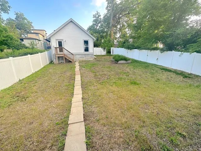 Fenced backyard and detached garage at 1108 Lenore St, Nashville, TN 37206