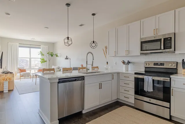 Kitchen open to living area at 1677 54th Ave N, 336, Nashville, TN 37209
