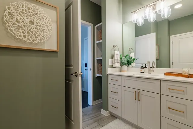 Bathroom vanity and mirror at 1677 54th Ave N, 336, Nashville, TN 37209