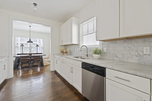 Kitchen with white cabinetry at 1708 B 4th Ave N, Nashville, TN 37208