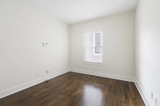 Empty bedroom with hardwood flooring at 1708 B 4th Ave N, Nashville, TN 37208