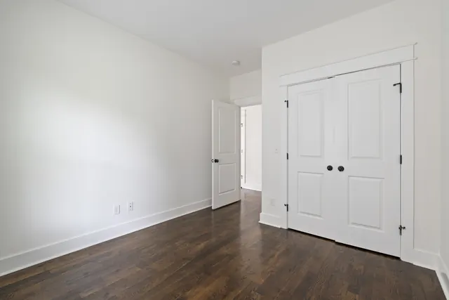 Bedroom with closet doors at 1708 B 4th Ave N, Nashville, TN 37208