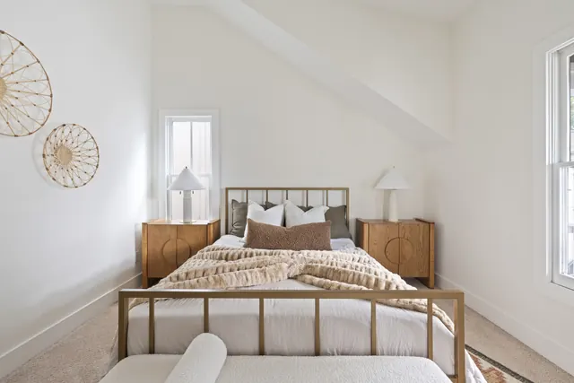 Primary bedroom bed and nightstands at 1708 B 4th Ave N, Nashville, TN 37208
