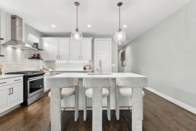 Kitchen island with bar seating at 2216 Sadler Ave, B, Nashville, TN 37210