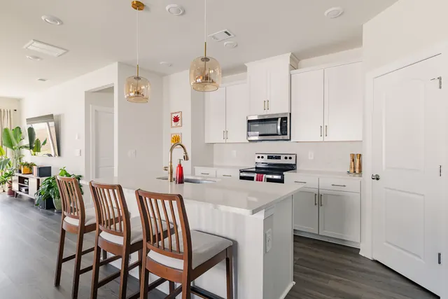 Kitchen with island and white cabinets at 4905 Trail Ridge Ct, Nashville, TN 37207