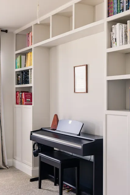 Built-in bookcase with piano at 4905 Trail Ridge Ct, Nashville, TN 37207