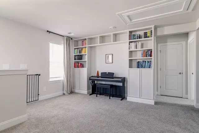 Loft with built-in bookshelves at 4905 Trail Ridge Ct, Nashville, TN 37207