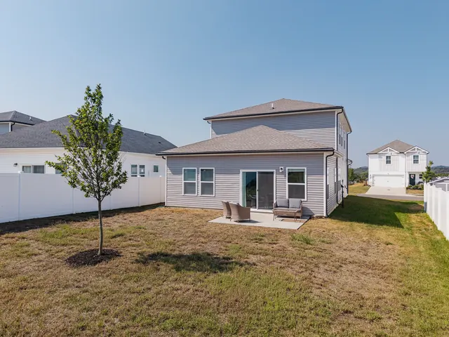 Rear exterior with patio and yard at 4905 Trail Ridge Ct, Nashville, TN 37207
