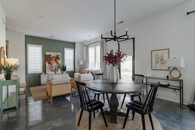 Dining area open to living room at 505 Croley Dr, Nashville, TN 37209