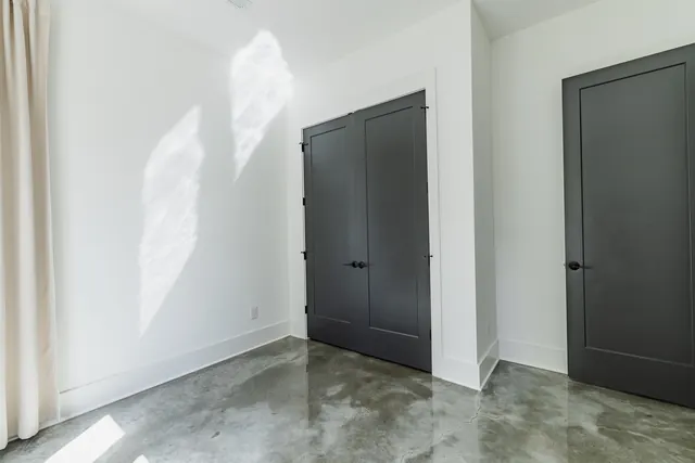Empty bedroom with concrete flooring at 505 Croley Dr, Nashville, TN 37209