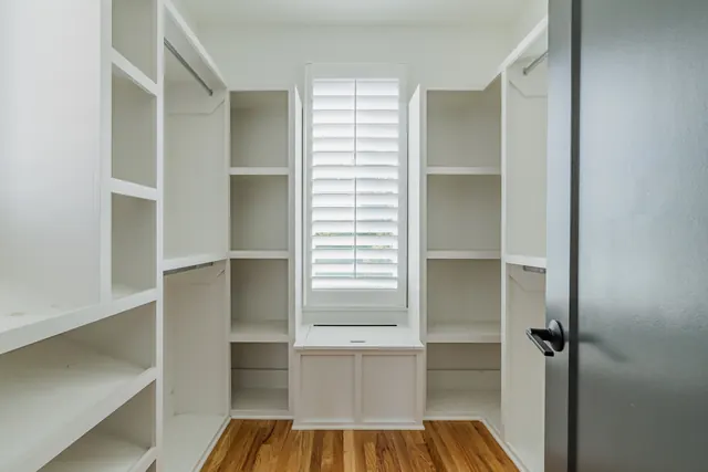 Walk-in closet with built-in shelving at 505 Croley Dr, Nashville, TN 37209