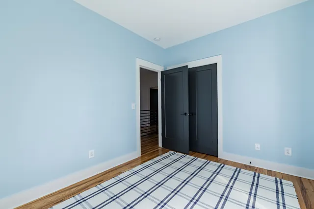 Bedroom with closet doors at 505 Croley Dr, Nashville, TN 37209