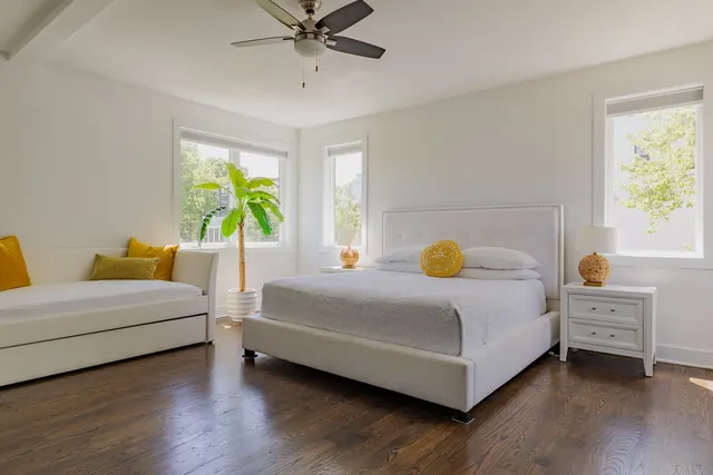 Primary bedroom with hardwood floors at 603 S 20th St, Nashville, TN 37206
