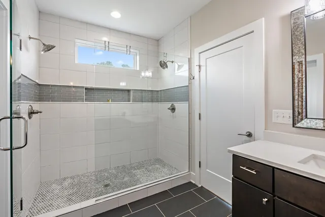 Walk-in shower with dual showerheads at 603 S 20th St, Nashville, TN 37206
