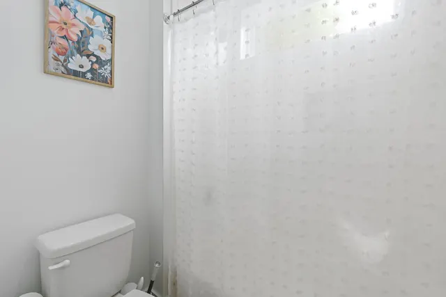 Bathroom with shower curtain at 603 S 20th St, Nashville, TN 37206