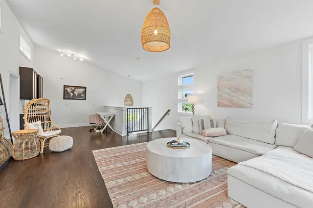Bonus room with sectional and wet bar at 603 S 20th St, Nashville, TN 37206