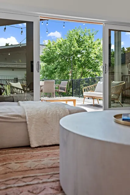 View of deck through glass doors at 603 S 20th St, Nashville, TN 37206