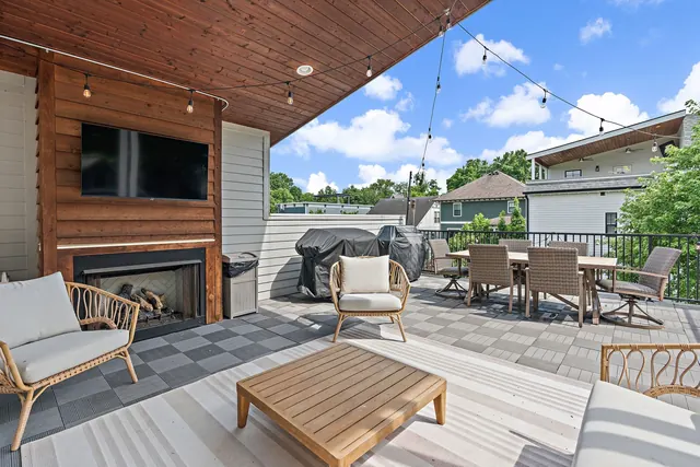 Rooftop deck with fireplace and TV at 603 S 20th St, Nashville, TN 37206