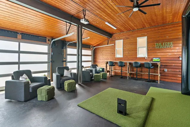 Garage with golf simulator seating at 603 S 20th St, Nashville, TN 37206
