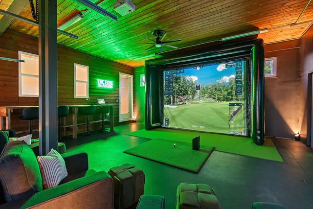 Golf simulator in garage at 603 S 20th St, Nashville, TN 37206